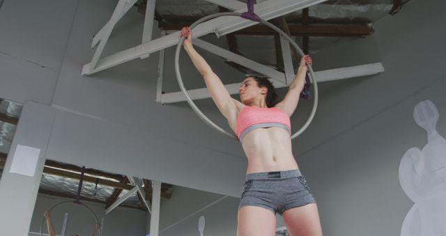 Fit Woman Exercising Aerial Hoop in Gym - Download Free Stock Images Pikwizard.com