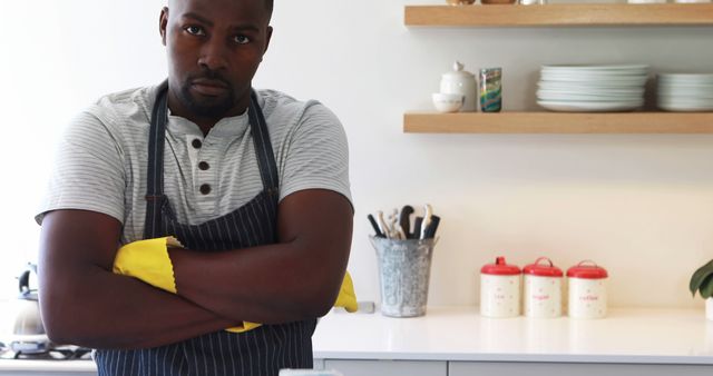 Chef in Kitchen Wearing Apron with Arms Crossed - Download Free Stock Images Pikwizard.com