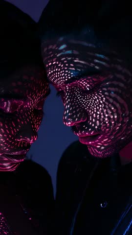 Intimate Couple Standing Under Projected Magenta Cyan Dots | Vertical Light Art Video