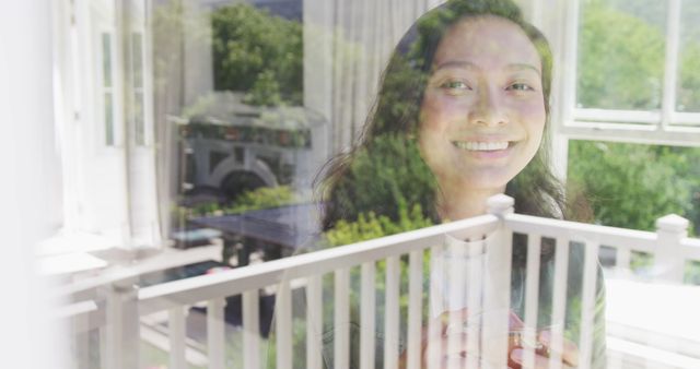 Woman Smiling Inside House, Reflected in Window - Download Free Stock Images Pikwizard.com