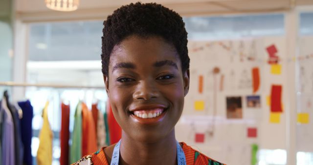 Confident Young African American Fashion Designer Smiling in Studio - Download Free Stock Images Pikwizard.com