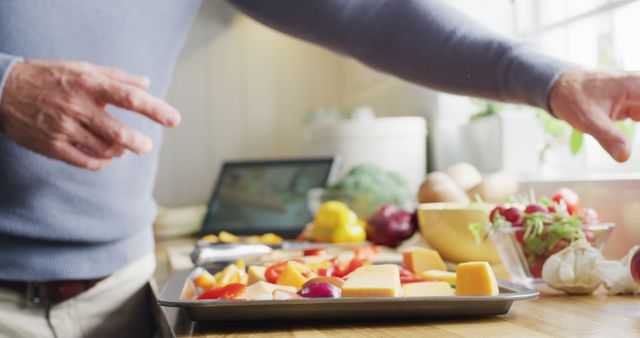 Man Cooking and Preparing Vegetables in Modern Kitchen - Download Free Stock Images Pikwizard.com