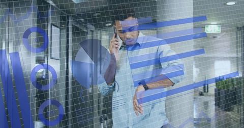 Businessman Analyzing Digital Data on Smartphone in Modern Office - Download Free Stock Images Pikwizard.com