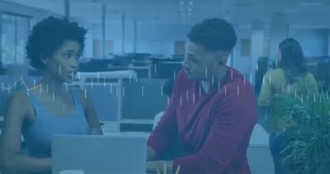 Colleagues Discussing Data Over Laptop in Modern Office