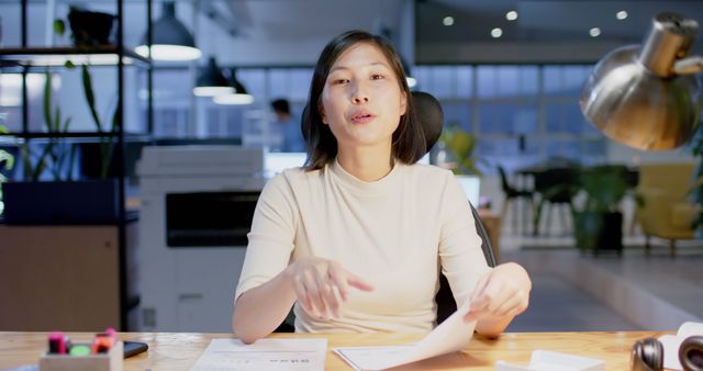 Young Professional Woman Working Late in Modern Office - Download Free Stock Images Pikwizard.com