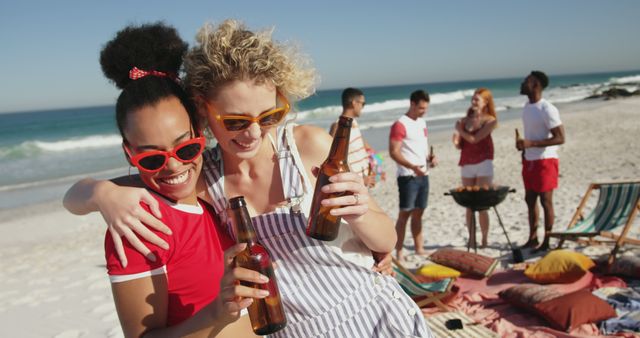 Friends Celebrating on Sunny Beach, Enjoying Beers and BBQ - Download Free Stock Images Pikwizard.com