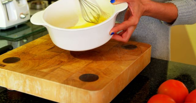 Person Mixing Ingredients in Kitchen with Whisk - Download Free Stock Images Pikwizard.com