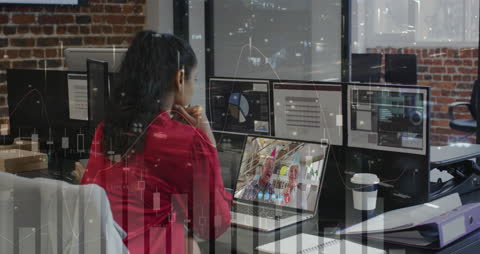 Businesswoman Analyzing Data with Digital Overlay in Modern Office