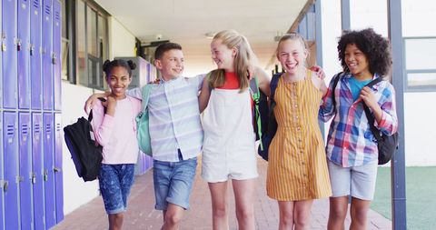 Diverse Schoolchildren Laughing in School Corridor - Download Free Stock Images Pikwizard.com