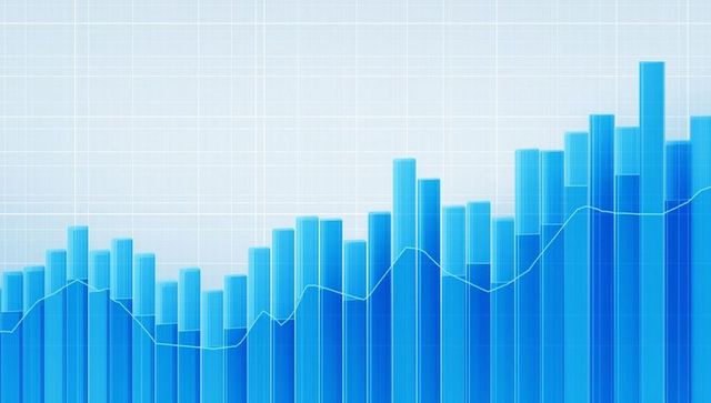 Blue bar chart with trend line on grid background