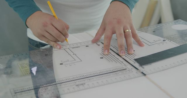 Architect Drawing Blueprint with Pencil and Ruler - Download Free Stock Images Pikwizard.com