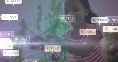 Child catching water with digital icons representing online connectivity