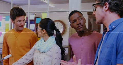 Multicultural team analyzing financial data business meeting