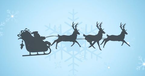 Santa Claus Sleigh Silhouette with Reindeer on Winter Background