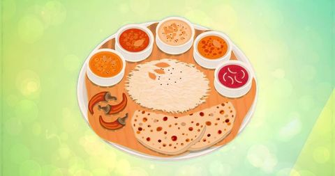 Serving indian vegetarian thali with rice, chapati and assorted curries on platter