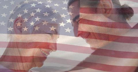 Elderly couple embracing under american flag overlay