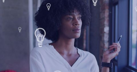 Creative businesswoman contemplates innovative ideas