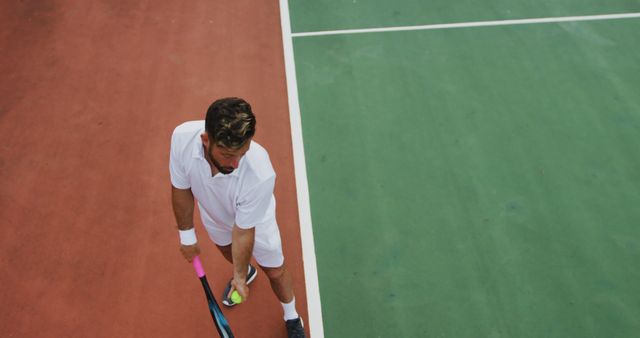 Tennis Player Setting up for Serve on Outdoor Court - Download Free Stock Images Pikwizard.com