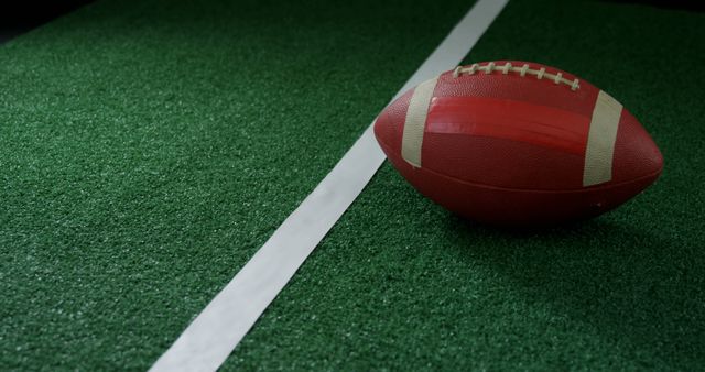 American Football on Green Field Turf near Yard Line - Download Free Stock Images Pikwizard.com