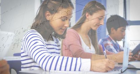 Students Engaging with Technology and Math Equations in Classroom - Download Free Stock Images Pikwizard.com