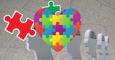Autism awareness concept with puzzle pieces and human head