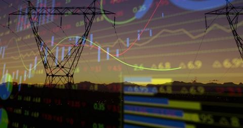 Transmission tower silhouette overlaid with financial charts at sunset for energy market concepts