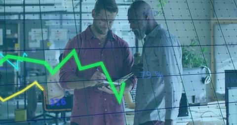 Business team analyzing data with overlaid stock graphs