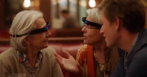 Seniors Discuss Technology Innovations in Retro Diner