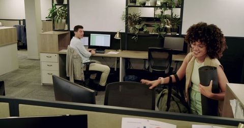 Diverse professional workspace with yoga in modern office