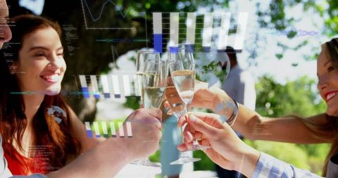 Friends toasting with champagne flutes outdoors with AR infographic overlays