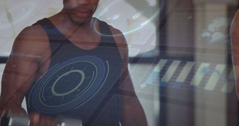 Man lifting dumbbell in gym with futuristic hud data overlay for fitness training
