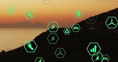 Digital ecology icons over scenic sunset landscape