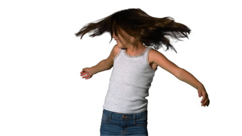Energetic Young Girl Twirling with Joyful Expression