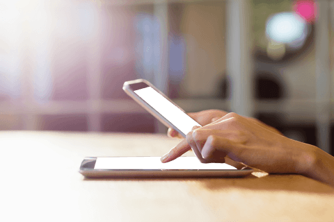 Businesswoman's Hands Using Smartphone and Tablet in Modern Office Environment - Download Free Stock Videos Pikwizard.com