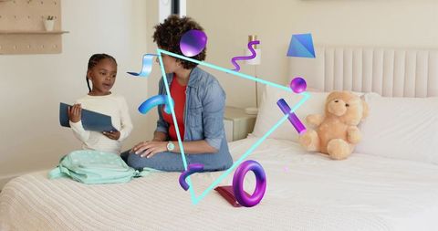 Mother and daughter bonding with tablet in cozy bedroom featuring augmented 3d geometric overlays