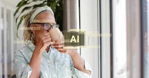 Senior woman sipping coffee near window with ai augmented reality overlay, wearing glasses