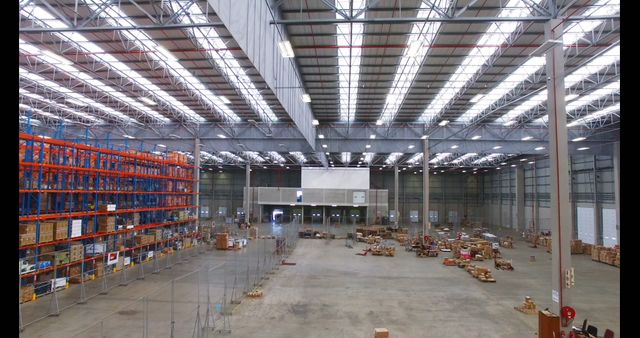 Spacious Modern Warehouse with Storage Racks and Pallets - Download Free Stock Images Pikwizard.com
