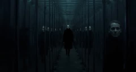 Mysterious Figure in Mirror Corridor with Thoughtful Reflections