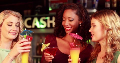 Friends Enjoying Colorful Cocktails at Bar with Happy Expressions - Download Free Stock Images Pikwizard.com