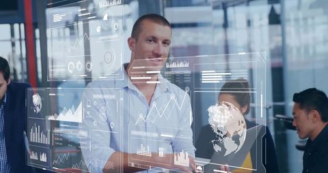 Diverse Team Analyzing Digital Interface with Data Charts - Download Free Stock Images Pikwizard.com