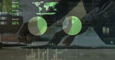 Professional analyzing data with tablet and stylus in modern workspace