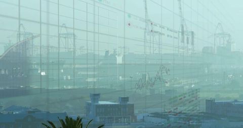 Foggy harbor port with container cranes, cargo ships and financial data overlay for logistics insigh
