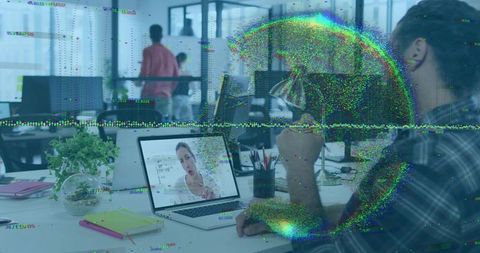 Man drinking coffee during video call with digital glitch overlay in open-plan office