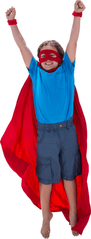 Joyful Boy with Raised Hands Wearing Superhero Cape and Mask in Transparent Background