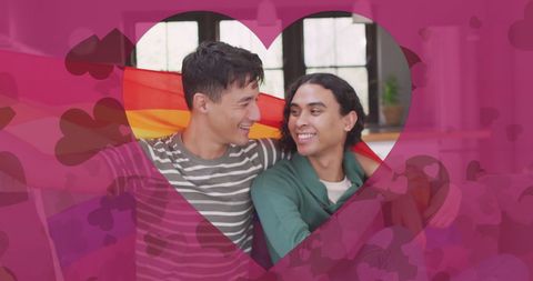 Diverse Gay Couple Celebrating Pride with Rainbow Flag Embrace