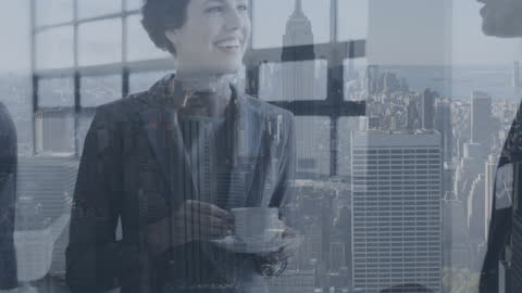 Business Professionals Discussing Against City Skyline