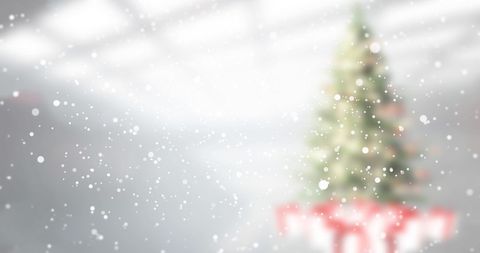 Festive Christmas Tree with Snowfall and Ambient Glow