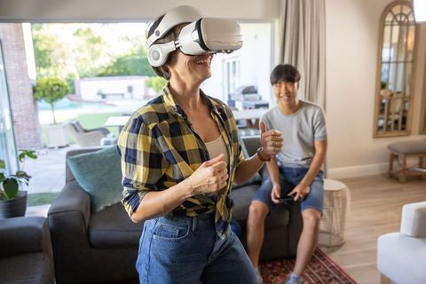 Family Virtual Reality Encounter: Mother and Son Gaming Fun