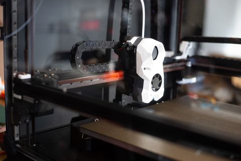 Close-up view of technology modern 3d printer in action