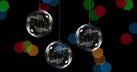 Hanging Clear Baubles with Festive Fairy Lights on Black